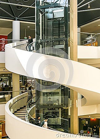 Spiral stairway and glass elevator in Westfield Belconnen Shopping Centre in Canberra, Australia Editorial Stock Photo