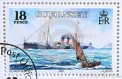 Cancelled postage stamp printed by Guernsey, that shows Paddle-Steamer Great Western Editorial Stock Photo