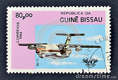 Cancelled postage stamp printed by Guinea Bissau, that shows Airplane Il-76, I.C.A.O. Editorial Stock Photo