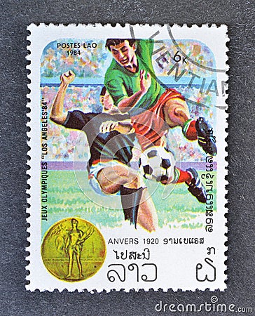 Cancelled postage stamp printed by Laos, that shows Football Editorial Stock Photo