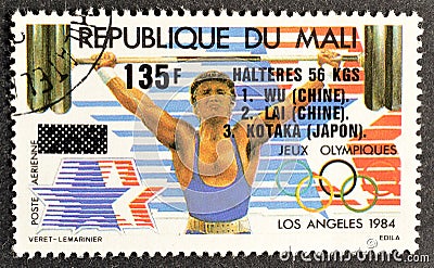 Cancelled postage stamp printed by Mali, that shows Weight lifting Editorial Stock Photo