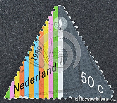 Cancelled postage stamp printed by Netherlands, that shows Candle Editorial Stock Photo