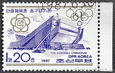 Cancelled postage stamp printed by North Korea, that shows The handball gymnasium Editorial Stock Photo