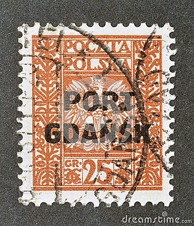 Cancelled postage stamp printed by Poland, that shows Coat of arms, overprinted Editorial Stock Photo