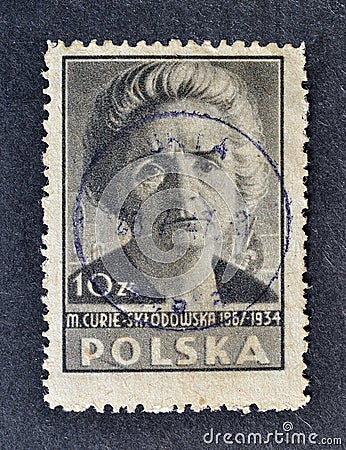 Cancelled postage stamp printed by Poland, that shows portrait of Marie Sklodowska Curie Editorial Stock Photo