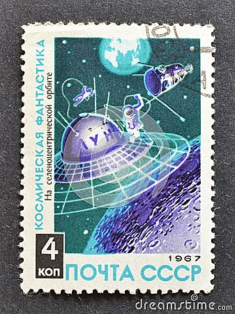Cancelled postage stamp printed by Soviet Union, that shows Space Walk in Lunar Orbit Editorial Stock Photo