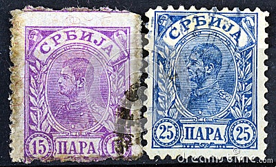 Cancelled postage stamps printed by Serbia, that show portrait of King Alexander Editorial Stock Photo