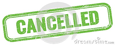 CANCELLED text on green grungy vintage stamp Stock Photo