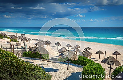 Cancun beach in mexico with umbrellas Stock Photo