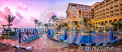 Cancun beach resort with palms Stock Photo