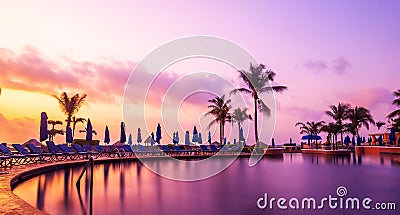 Cancun beach resort with palms Stock Photo