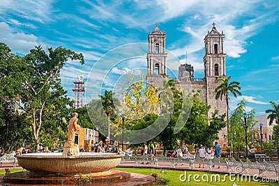 Footpath amidst garden and fountain with San Servacio church Editorial Stock Photo