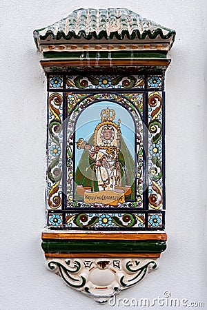 Virgin of Candelaria, Saint Patron of the Canary Islands. Nice picture of colored ceramics on the wall of a house Editorial Stock Photo