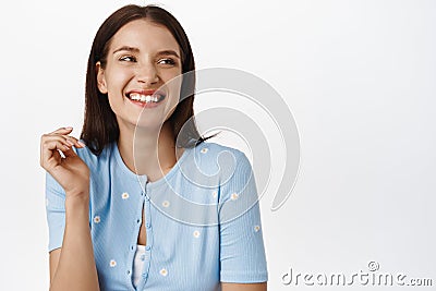 Candid people. Beautiful natural woman with dark hair, glowing healthy skin without makeup, laughing and smiling white Stock Photo