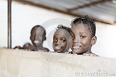 Candid Portrait of Three Gorgeous African Children Smiling, Laughing and Enjoying Photos Stock Photo
