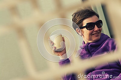 Candid Woman Outdoors with Coffee Stock Photo