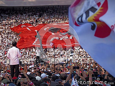 Candidates for President Joko Widodo campaign in front of hundreds of thousands of supporters at GBK Senayan. Editorial Stock Photo