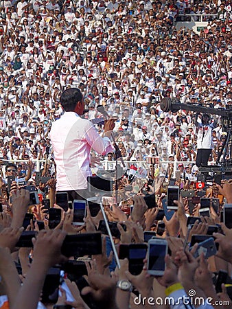 Candidates for President Joko Widodo campaign in front of hundreds of thousands of supporters at GBK Senayan. Editorial Stock Photo