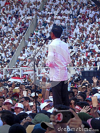 Candidates for President Joko Widodo campaign in front of hundreds of thousands of supporters at GBK Senayan. Editorial Stock Photo