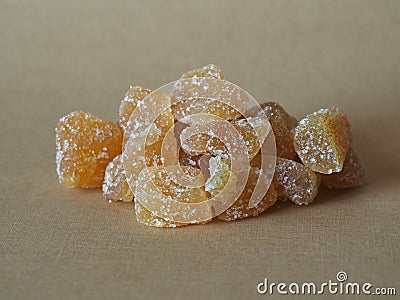 Candied ginger root pieces with sugar Stock Photo