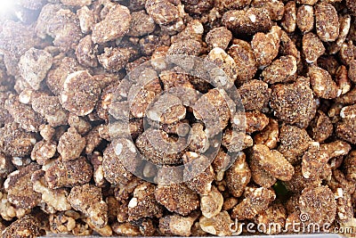 Candied nuts, sweetmeats, comfit. Comfit Walnuts Stock Photo