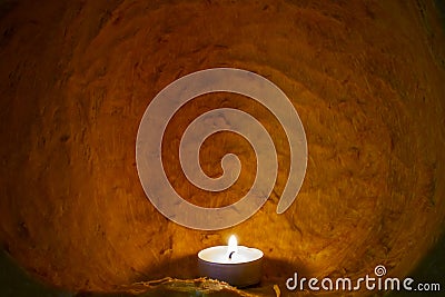 Candle burning inside a cleaned pumpkin, carved interior , abstract texture, soft focus close up Stock Photo