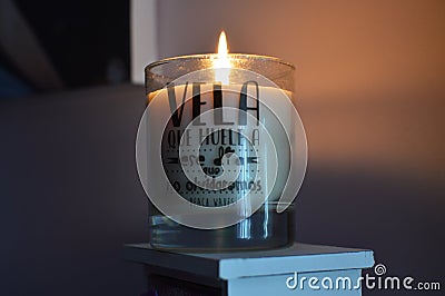 Candle With A Day Message That Do not Forget, With Blurred Wedding Photo Behind. Weddings, Links, Marriage. Screensavers Backgroun Stock Photo