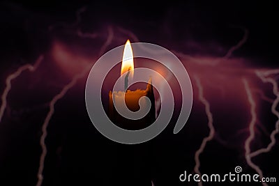 candle flame on blurred background spark of lightning close-up Stock Photo