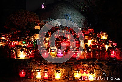 Candle on the grave of Warsaw Uprising soldiers Stock Photo