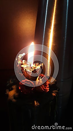 Candle with hand made roses Stock Photo