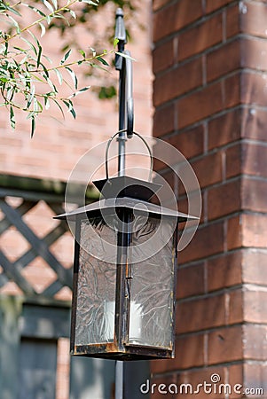 A Candle Lantern Hangs in the Garden Stock Photo