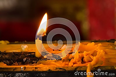 Candle light heart and candle drippings. Stock Photo
