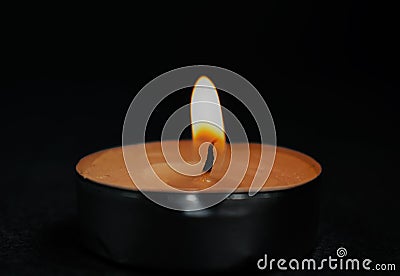 The candle of memory dark fire flame night Stock Photo