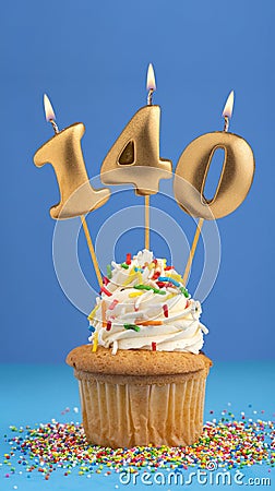 Candle number 140 - Cupcake birthday in blue background Stock Photo