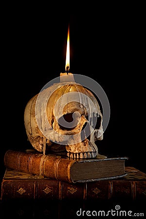 Candle on skull 1 Stock Photo