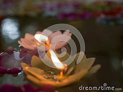 Candle In the water. Stock Photo