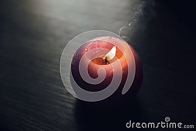 Candle on wooden background Stock Photo