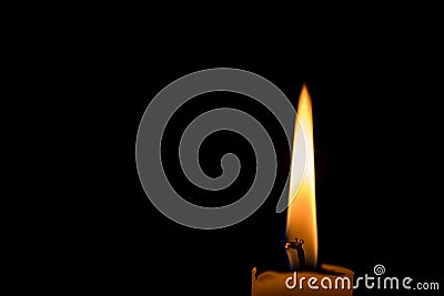 Candlelight burning isolated on black background close up Stock Photo