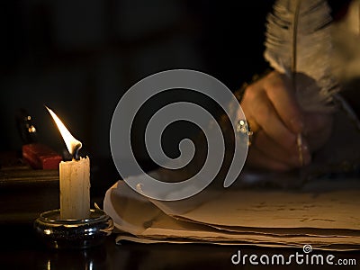 Candlelight & Quill Stock Photo