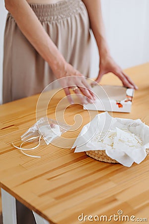 Candlemaker`s workplace. Soy Flakes. Wooden candlestick table Stock Photo