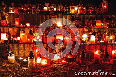 Candles in the cemetery. 1st November. Feast of All Saints. Hallowmas. All Souls& x27; Day. Stock Photo