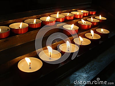 Candles in a church Stock Photo