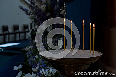 Candles in the church (candles for the living and the dead Stock Photo