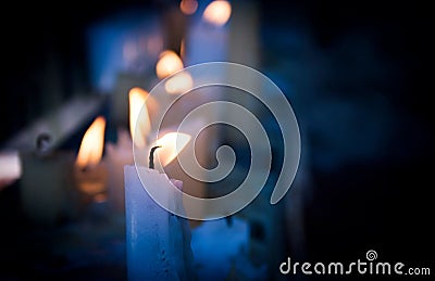 Candles in the darkness Stock Photo