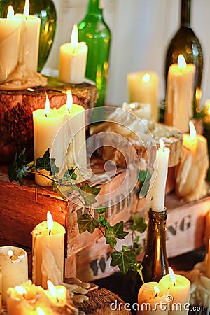 Candles decoration wedding dinner. composition with thick candles on the floor Stock Photo