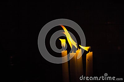 Candles flames in night Stock Photo