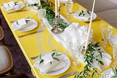 Candles and goblets on a decorated wedding table. selective focus Stock Photo