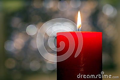 Candles light. Christmas candle burning at night. Abstract candl Stock Photo