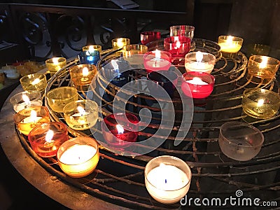 Candles with light in the notredame de Paris Stock Photo