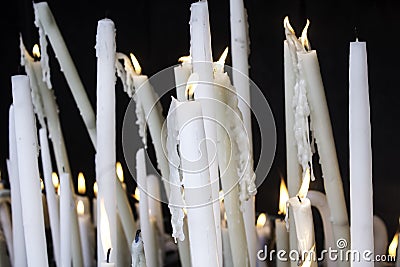 Candles lit lourdes Stock Photo